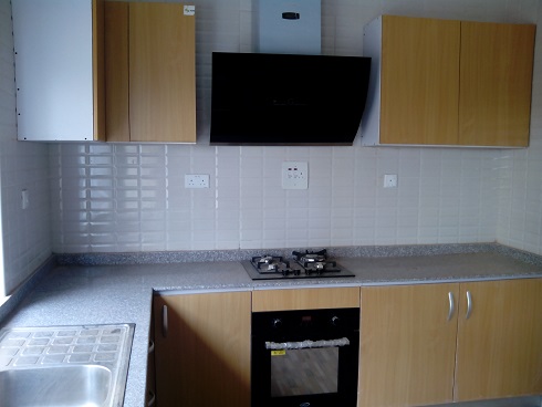 https://www.yemtechconstruction.com/wp-content/uploads/2015/04/Omofade-Crescent-Omole-phase-1-4-units-of-5-bedroom-kitchen.jpg